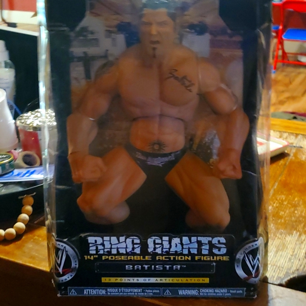 Ring giants Batista 14" autographed